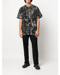 schwarzes bedrucktes T-Shirt mit einem Rundhalsausschnitt von Comme Des Garcons Homme Plus