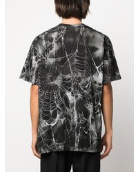 schwarzes bedrucktes T-Shirt mit einem Rundhalsausschnitt von Comme Des Garcons Homme Plus