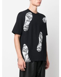 schwarzes bedrucktes T-Shirt mit einem Rundhalsausschnitt von Comme des Garcons Homme