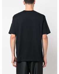 schwarzes bedrucktes T-Shirt mit einem Rundhalsausschnitt von Comme des Garcons Homme