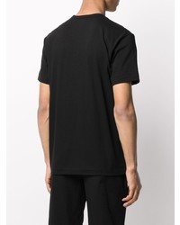 schwarzes bedrucktes T-Shirt mit einem Rundhalsausschnitt von Comme des Garcons