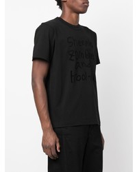 schwarzes bedrucktes T-Shirt mit einem Rundhalsausschnitt von Sacai