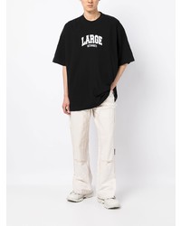 schwarzes bedrucktes T-Shirt mit einem Rundhalsausschnitt von Vetements