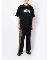 schwarzes bedrucktes T-Shirt mit einem Rundhalsausschnitt von Vetements