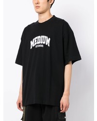 schwarzes bedrucktes T-Shirt mit einem Rundhalsausschnitt von Vetements