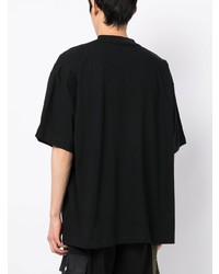 schwarzes bedrucktes T-Shirt mit einem Rundhalsausschnitt von Vetements