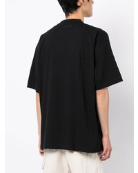 schwarzes bedrucktes T-Shirt mit einem Rundhalsausschnitt von Vetements