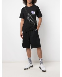 schwarzes bedrucktes T-Shirt mit einem Rundhalsausschnitt von Stussy