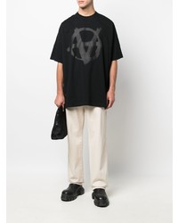 schwarzes bedrucktes T-Shirt mit einem Rundhalsausschnitt von Vetements