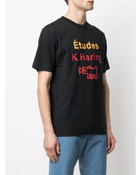 schwarzes bedrucktes T-Shirt mit einem Rundhalsausschnitt von Études