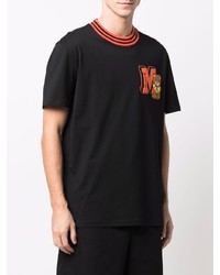 schwarzes bedrucktes T-Shirt mit einem Rundhalsausschnitt von Moschino