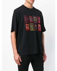 schwarzes bedrucktes T-Shirt mit einem Rundhalsausschnitt von Marcelo Burlon County of Milan