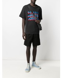 schwarzes bedrucktes T-Shirt mit einem Rundhalsausschnitt von Maison Margiela