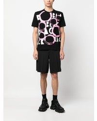 schwarzes bedrucktes T-Shirt mit einem Rundhalsausschnitt von Black Comme Des Garçons