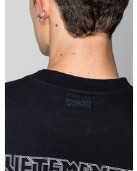 schwarzes bedrucktes T-Shirt mit einem Rundhalsausschnitt von Vetements