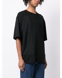 schwarzes bedrucktes T-Shirt mit einem Rundhalsausschnitt von Children Of The Discordance