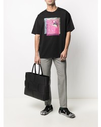 schwarzes bedrucktes T-Shirt mit einem Rundhalsausschnitt von Maison Margiela