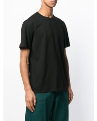 schwarzes bedrucktes T-Shirt mit einem Rundhalsausschnitt von Raf Simons