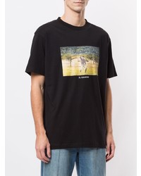 schwarzes bedrucktes T-Shirt mit einem Rundhalsausschnitt von Marcelo Burlon County of Milan