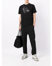 schwarzes bedrucktes T-Shirt mit einem Rundhalsausschnitt von Armani Exchange