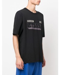 schwarzes bedrucktes T-Shirt mit einem Rundhalsausschnitt von Heron Preston