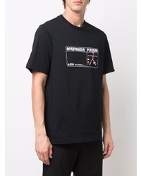 schwarzes bedrucktes T-Shirt mit einem Rundhalsausschnitt von Oamc