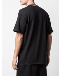 schwarzes bedrucktes T-Shirt mit einem Rundhalsausschnitt von Supreme