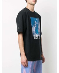 schwarzes bedrucktes T-Shirt mit einem Rundhalsausschnitt von Heron Preston