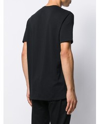 schwarzes bedrucktes T-Shirt mit einem Rundhalsausschnitt von Benetton
