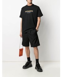 schwarzes bedrucktes T-Shirt mit einem Rundhalsausschnitt von Vetements