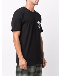 schwarzes bedrucktes T-Shirt mit einem Rundhalsausschnitt von Stussy