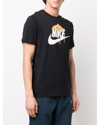 schwarzes bedrucktes T-Shirt mit einem Rundhalsausschnitt von Nike