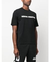 schwarzes bedrucktes T-Shirt mit einem Rundhalsausschnitt von Heron Preston