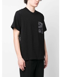 schwarzes bedrucktes T-Shirt mit einem Rundhalsausschnitt von VERSACE JEANS COUTURE