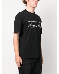 schwarzes bedrucktes T-Shirt mit einem Rundhalsausschnitt von Martine Rose