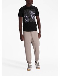 schwarzes bedrucktes T-Shirt mit einem Rundhalsausschnitt von Armani Exchange