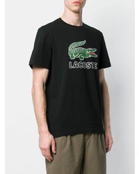 schwarzes bedrucktes T-Shirt mit einem Rundhalsausschnitt von Lacoste