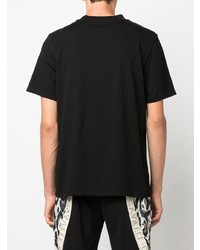 schwarzes bedrucktes T-Shirt mit einem Rundhalsausschnitt von Roberto Cavalli