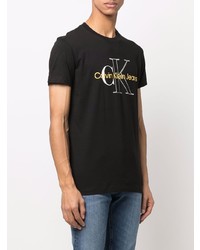 schwarzes bedrucktes T-Shirt mit einem Rundhalsausschnitt von Calvin Klein Jeans