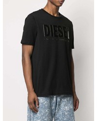 schwarzes bedrucktes T-Shirt mit einem Rundhalsausschnitt von Diesel