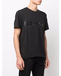 schwarzes bedrucktes T-Shirt mit einem Rundhalsausschnitt von Calvin Klein