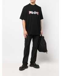 schwarzes bedrucktes T-Shirt mit einem Rundhalsausschnitt von Vetements