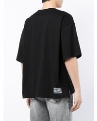 schwarzes bedrucktes T-Shirt mit einem Rundhalsausschnitt von Maison Mihara Yasuhiro