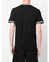 schwarzes bedrucktes T-Shirt mit einem Rundhalsausschnitt von Moschino