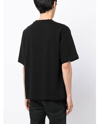 schwarzes bedrucktes T-Shirt mit einem Rundhalsausschnitt von Off-White