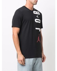 schwarzes bedrucktes T-Shirt mit einem Rundhalsausschnitt von Nike