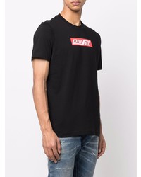 schwarzes bedrucktes T-Shirt mit einem Rundhalsausschnitt von Diesel