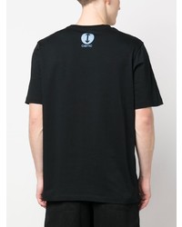 schwarzes bedrucktes T-Shirt mit einem Rundhalsausschnitt von Oamc