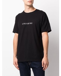 schwarzes bedrucktes T-Shirt mit einem Rundhalsausschnitt von Stussy