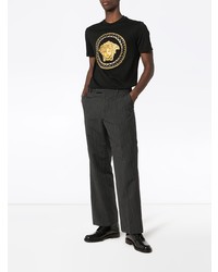 schwarzes bedrucktes T-Shirt mit einem Rundhalsausschnitt von Versace